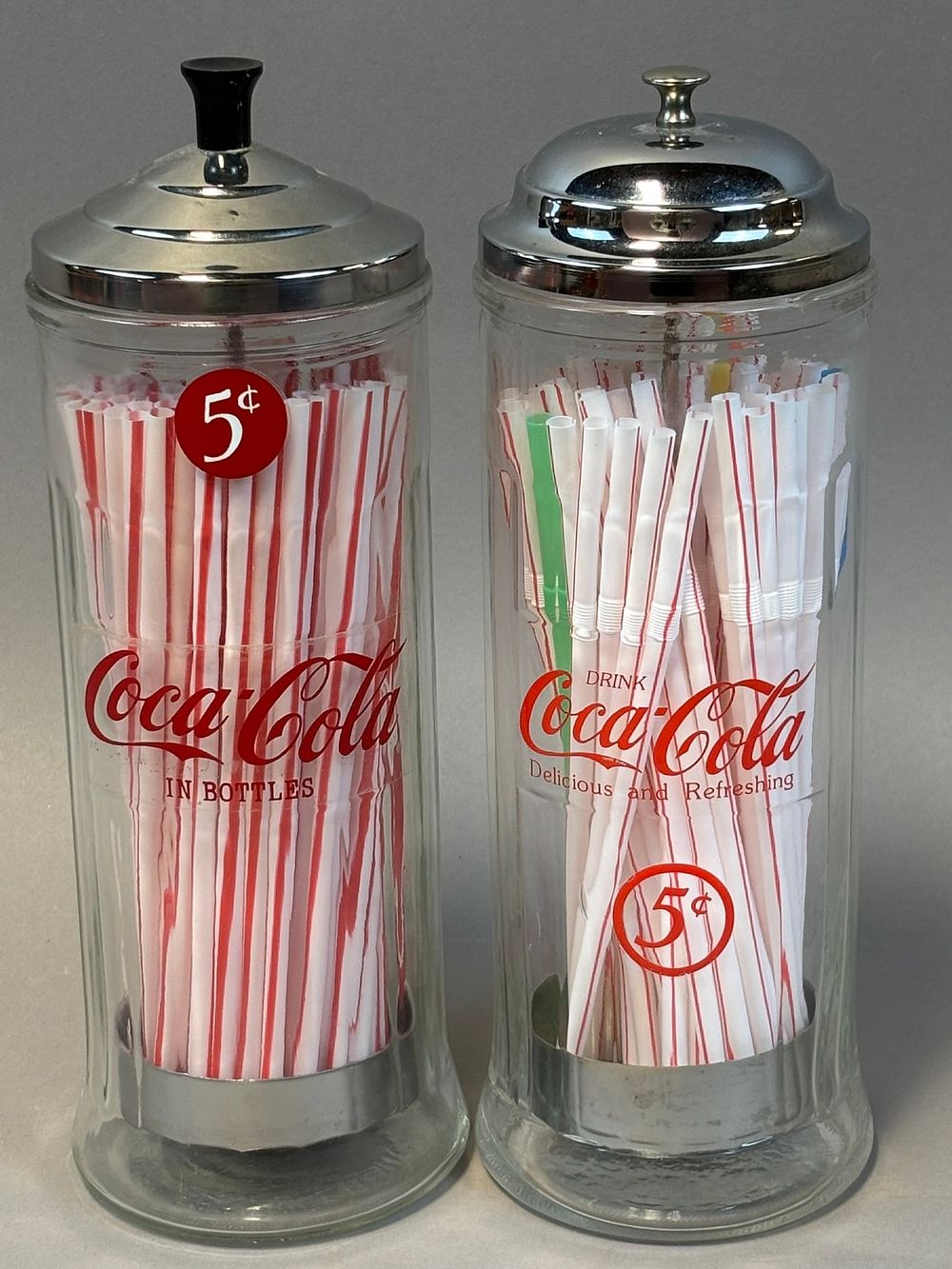 Lot 305: Pair Original Coca Cola In Bottles 5 Cent Glass Straw Holder Dispensers
