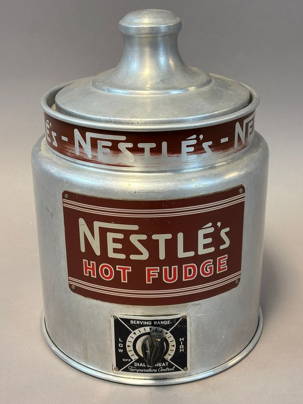 Lot 358: Nestle's Hot Fudge Soda Fountain Dispenser by Helmco Inc Chicago Illinois