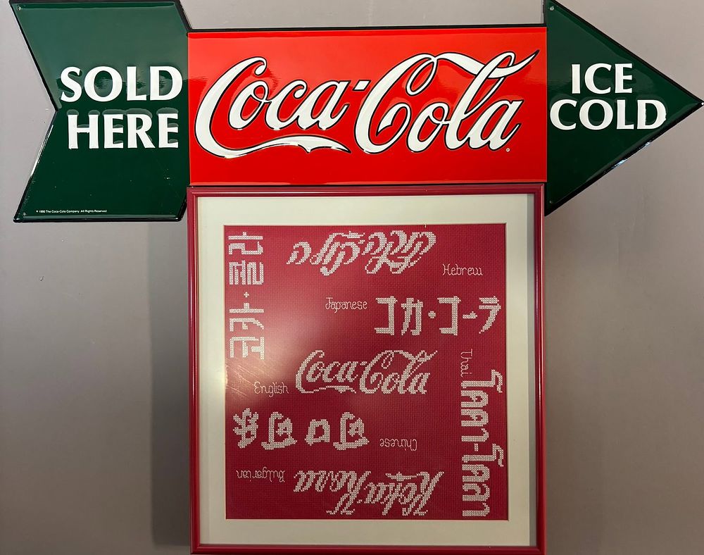 Lot 408: Pair Coca Cola Advertising Related Items 1990 Arrow & Crocheted Sign