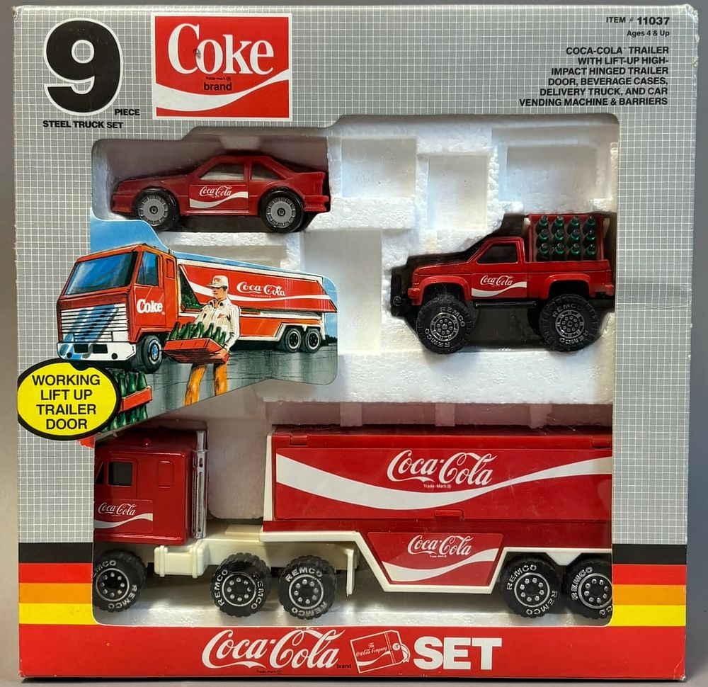 Lot 418: 9 Piece Coca Cola Toy Set w/ Original Box 1988 Incomplete
