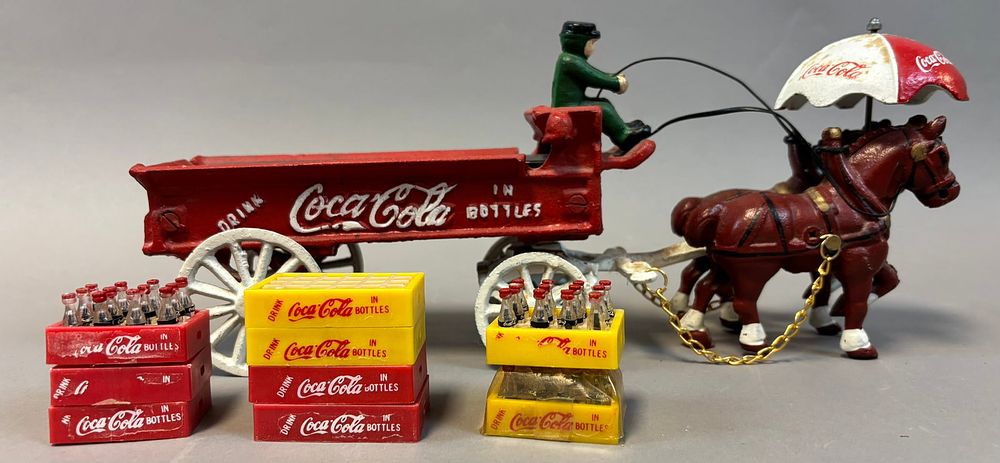 Lot 428: 10 Piece Lot Original Coca Cola Cast Iron Horse Toy 9 Plastic Mini Bottle Crates
