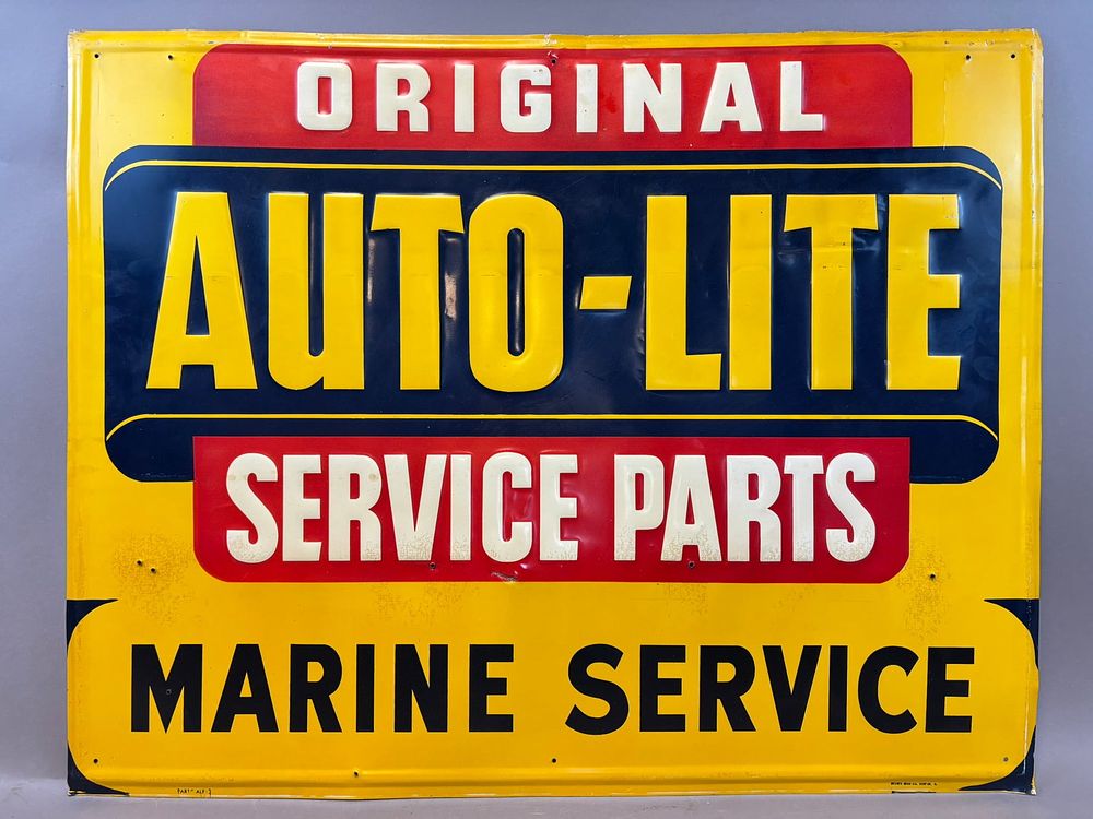 Lot 209: Original Auto-Lite Service Parts Marine Service SST Tin Embossed 30" Sign