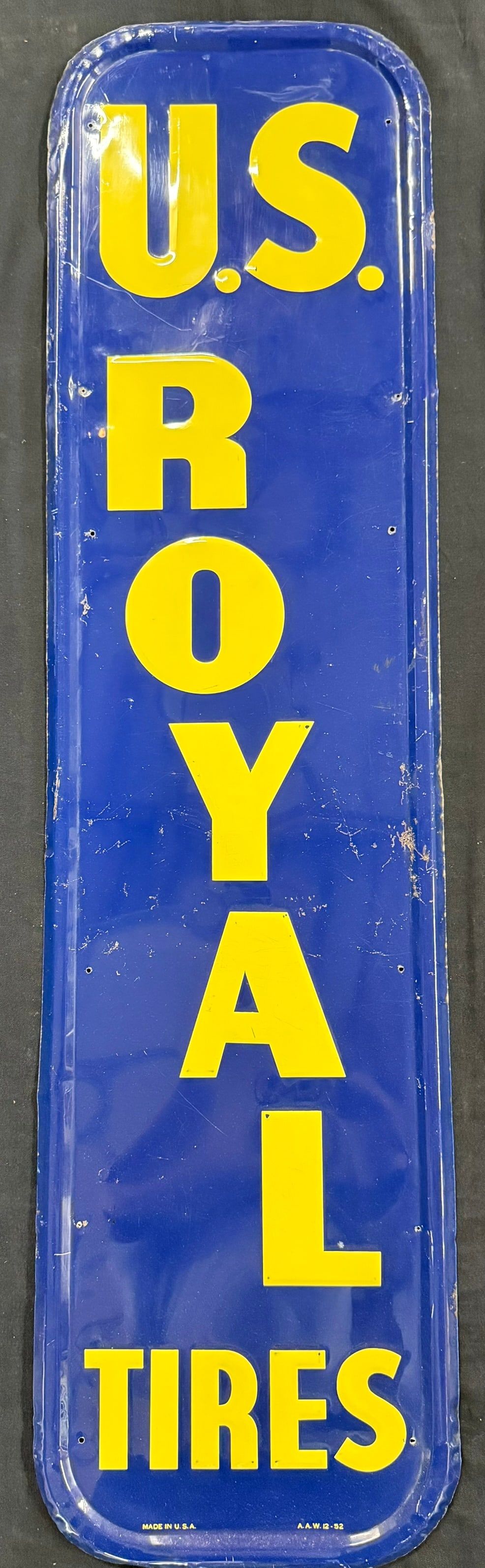 Lot 184: US Royal Tires Embossed 1952 Metal Vertical Advertising Sign