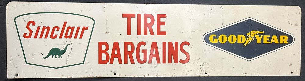 Lot 218: Sinclair Goodyear Tire Bargains SST Metal Rack Topper Sign