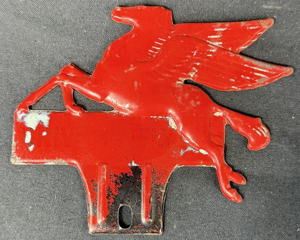 Lot 247: Drive Safely Embossed Mobil Pegasus License Plate Topper Sign