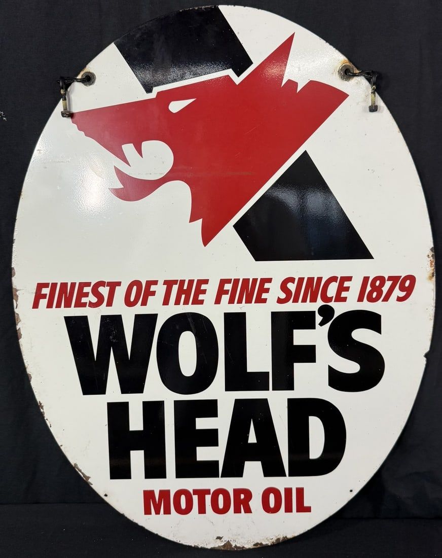 Lot 253: Wolf's Head Motor Oil DST Painted Metal Hanging Sign
