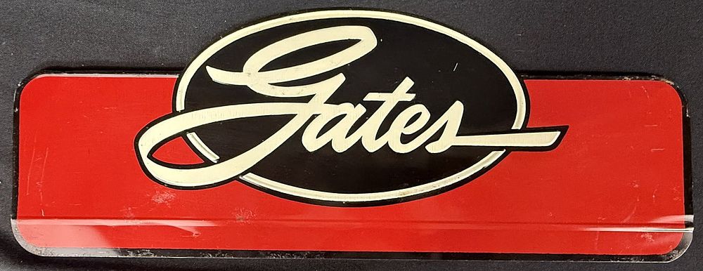 Lot 262: Gates SST Tin Embossed Tire Shop Rack Topper Service Sign