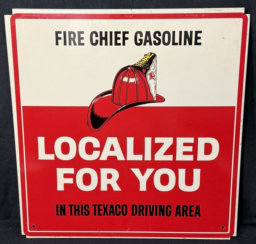 Lot 263: Texaco Driving Fire Chief Gasoline Localized SST Tin Sign