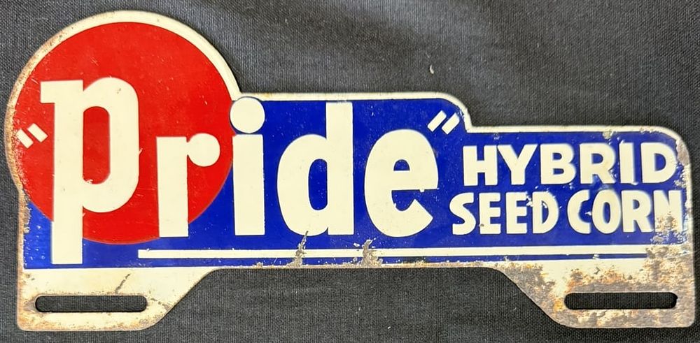 Lot 317: Pride Hybrid Seed Corn Painted Metal License Plate Topper