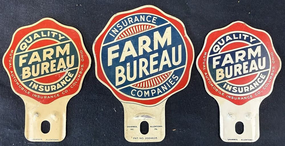 Lot 318: 3 Farm Bureau Quality Insurance Metal License Plater Topper