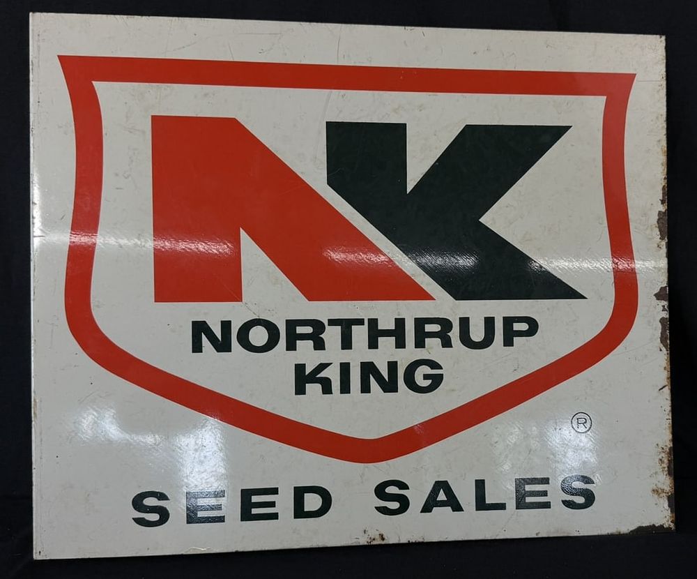 Lot 387: Northrup King Seed Sales DST Painted Metal Flange Farm Sign