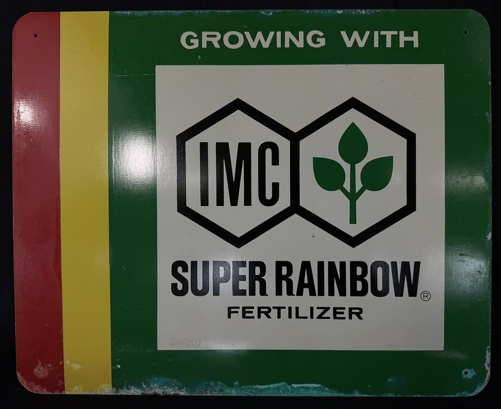 Lot 390: Growing With IMC Super Rainbow Fertilizer SST Tin Sign