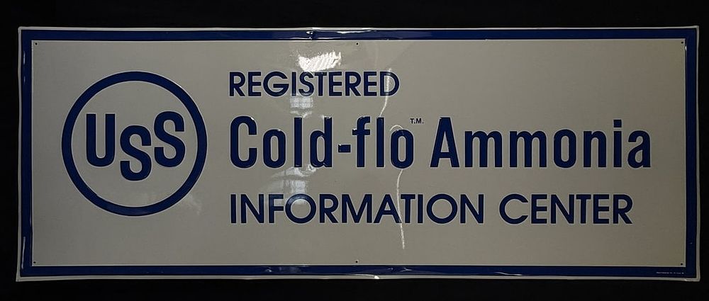 Lot 453: USS Cold-flo Ammonina Info Center SST Tin Embossed Sign