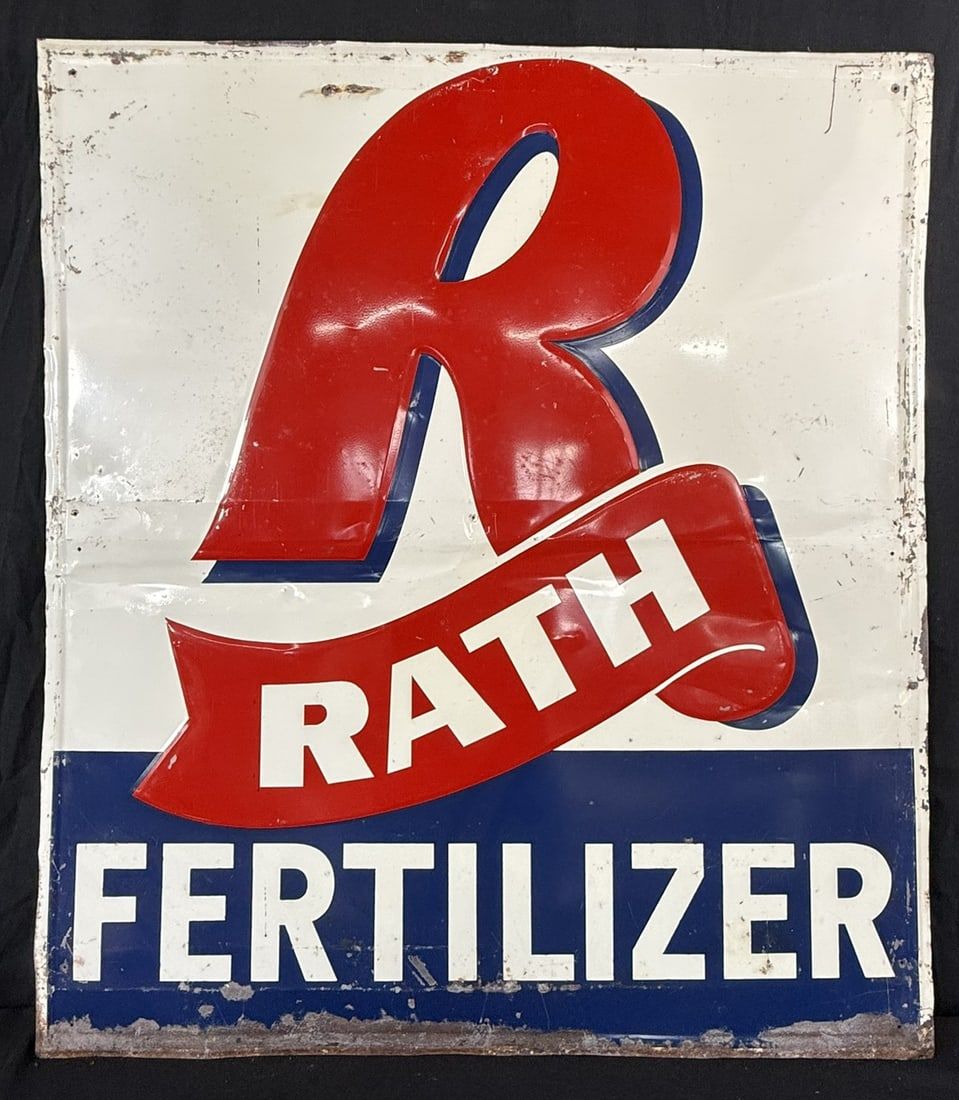 Lot 488: Rath Feeds Red White Blue Embossed Metal Farm Sign
