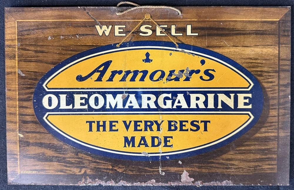 Lot 508: We Sell Armour's Oleomargarine Tin Over Cardboard Sign