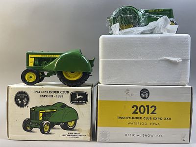 Pair John Deere Cast Iron Tractors NOS. Please make sure you view all photos and ask any 