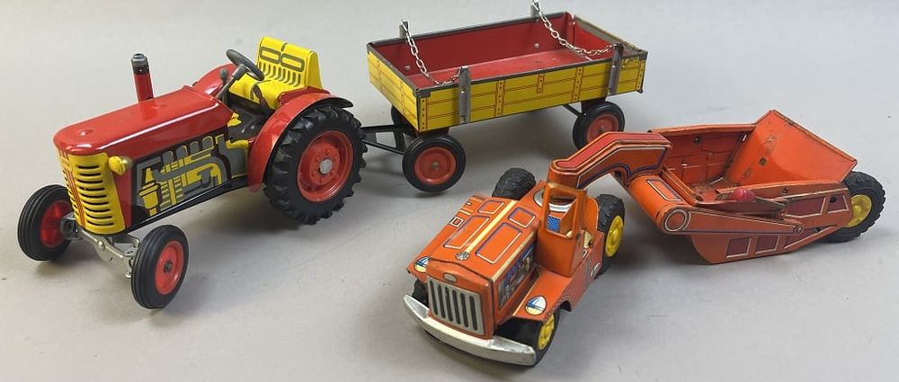 Lot 149: 2 Vintage Tin Litho Toy Tractors with Wagons