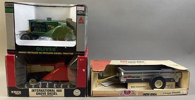 Two 1/16 Scale Model Tractors & Spreader Implement. Please make sure you view all photos and ask 