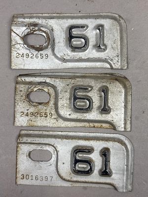 Lot of 3 1961 Michigan License Plate Renewal Tags. See all photos as a better idea of condition. 