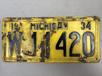 1934 Michigan W11420 Vintage License Plate. See all photos as a better idea of condition. 