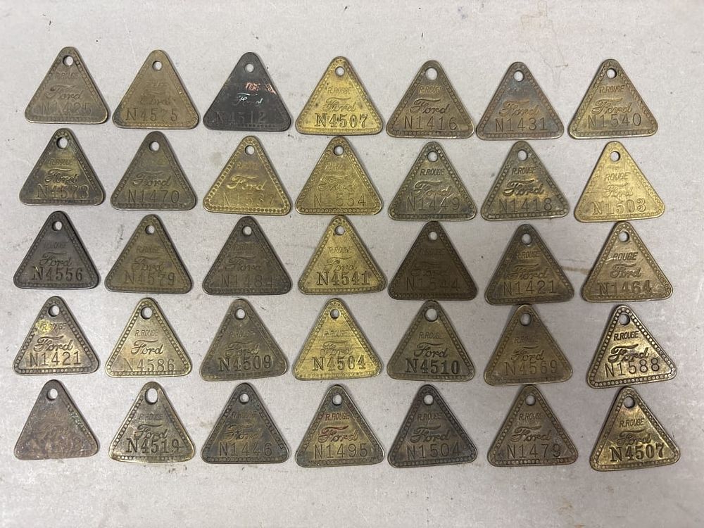 Lot 195: Lot of 35 Ford Motor Company Rouge Plant Tags