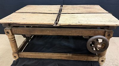 Machine Age Fur Stretching Adjustable Coffee Table. Talk about a unique piece here. This is one 