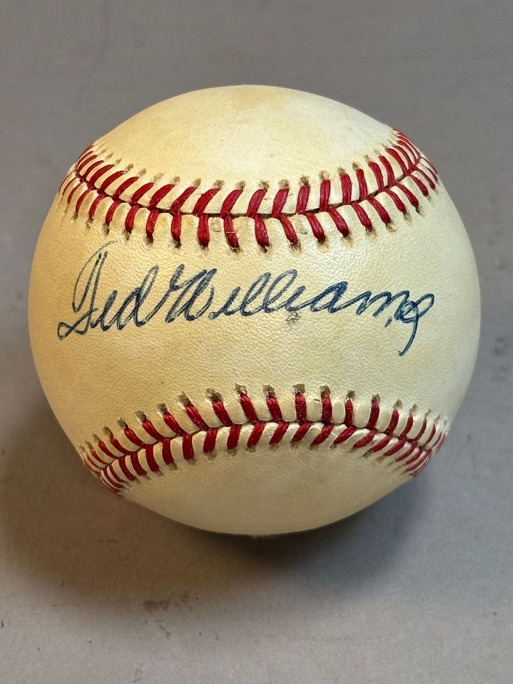 Lot 219: Ted Williams Single Signed Rawlings Brown Ball