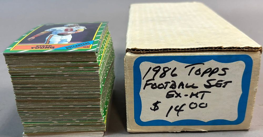 Lot 363A: 1986 TOPPS FOOTBALL LOT SET w/ RICE & YOUNG RC