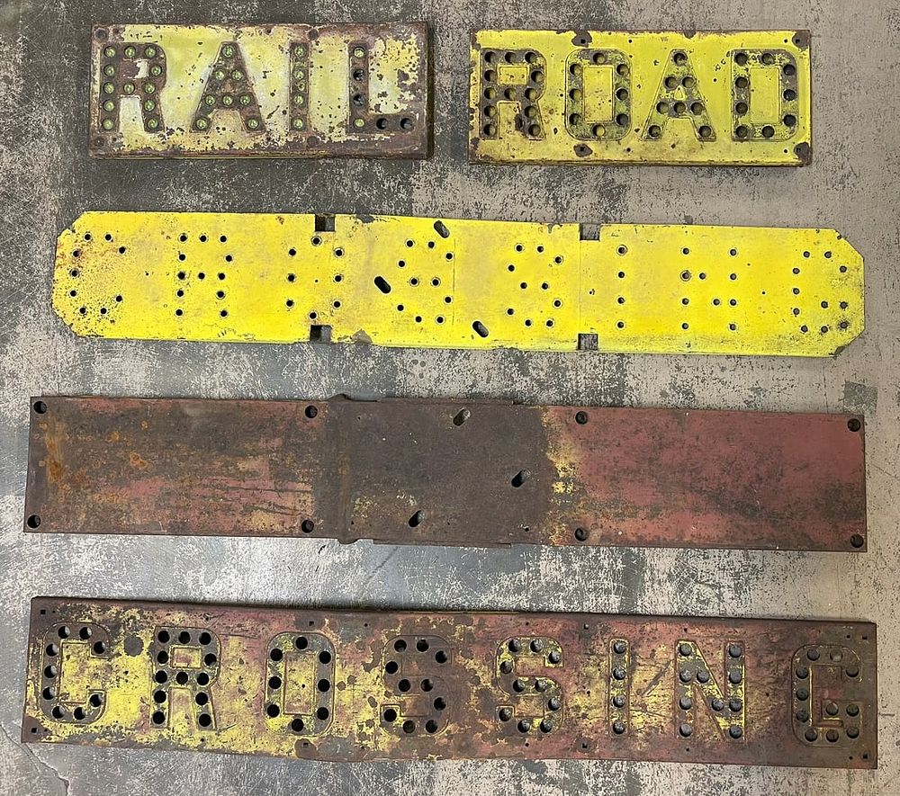 Lot 109: Railroad Crossing Original Cats Eye Marble Signs