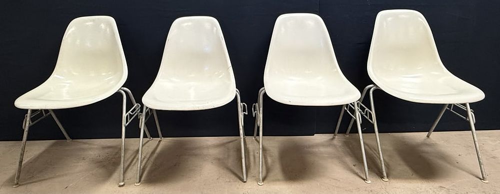 Lot 187: 4 MCM Herman Miller White Cream Stacking Chairs