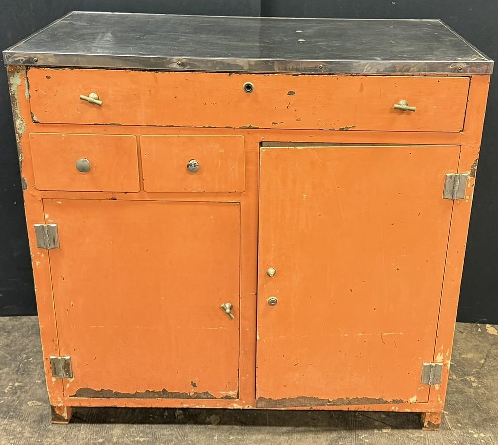 Lot 194: MCM 60s Pumpkin Painted Metal Medical Dental Cabinet