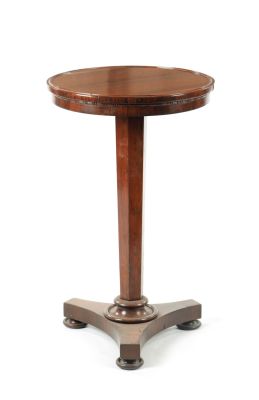 A VICTORIAN ROSEWOOD OCCASIONAL TABLE with hexagonal tapering stem and platorm base with turned 