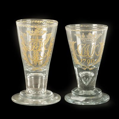 A GRADUATED PAIR OF GEORGE III SQUAT RUMMERS INITIALLED AND DATED 1790 &amp; 1801 the tapered 