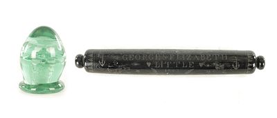 A 19TH CENTURY CONICAL GREEN GLASS DUMP/PAPERWEIGHT with internal flowering plant pot motif 