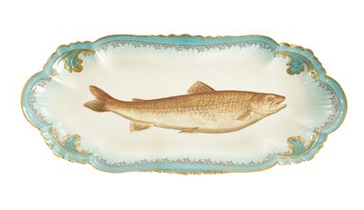 A LATE 19TH CENTURY FRENCH GLAZED POTTERY SALMON DISH the central fish design within a shaped 