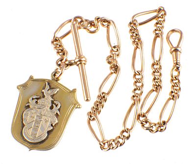 A 9CT GOLD ALBERT POCKET WATCH CHAIN WITH SILVER FOB the silver gilt fob with an applied silver 
