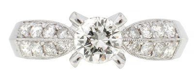 AN 18CT WHITE GOLD AND DIAMOND RING the brilliant-cut 0.5ct central diamond set with four claws 