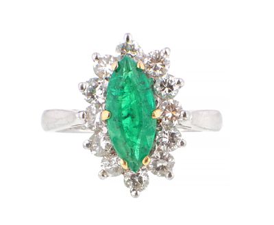A LADIES 18CT WHITE GOLD EMERALD AND DIAMOND RING, the marquise cut emerald in a six-claw 