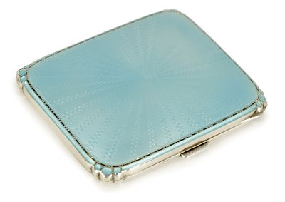 A GEORGE VI SILVER AND GUILLOCHE ENAMEL LADIES CIGARETTE CASE with light blue stitched sunburst 