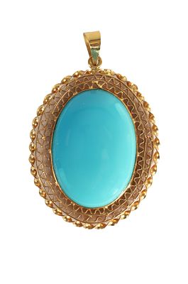 A LADIES' 18CT GOLD CABOCHON TURQUOISE OVAL PENDANT the large stone set in a filigree frame 