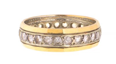 A 9CT YELLOW GOLD AND DIAMOND ETERNITY RING of faceted design, Size O, 4.3g (Ring Size O)