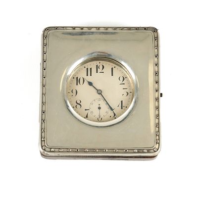 AN EARLY 20TH CENTURY SILVER WATCH STAND WITH POCKET WATCH, the stand with raised border and 