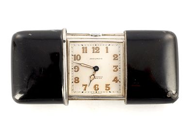 AN EARLY 20TH CENTURY SWISS MOVADO ERMETO SILVER ENAMEL TRAVEL WATCH, the sliding black enamel 
