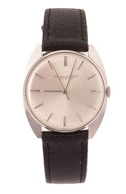 A GENTLEMAN'S VINTAGE STEEL IWC SCHAFFHAUSEN WRIST WATCH, on black leather strap, the stylish