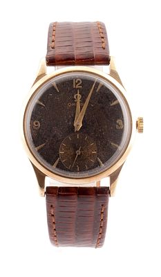 A GENTLEMAN'S 1950'S 9CT GOLD "TROPICAL DIAL" OMEGA WRIST WATCH, on leather strap, the black