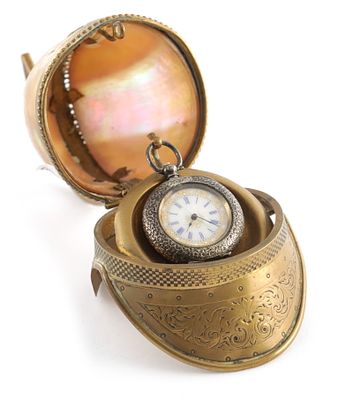 A 19TH CENTURY NOVELTY BRASS AND MOTHER OF PEARL POCKET WATCH STAND, modelled as a Trojan