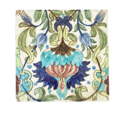 ATT. WILLIAM DE MORGAN (1839-1917). 19TH CENTURY EARTHENWARE TILE displaying a turquoise and 