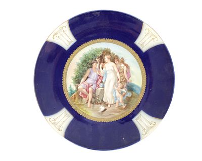 A LATE 19TH CENTURY VIENNA CABINET PLATE the dished centre finely painted with a maidens and 