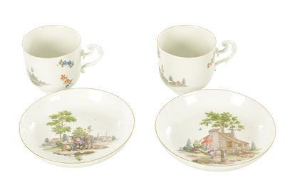 A PAIR OF MID 18TH CENTURY MEISSEN CUPS AND SAUCERS, having gilt rims and classical farming 