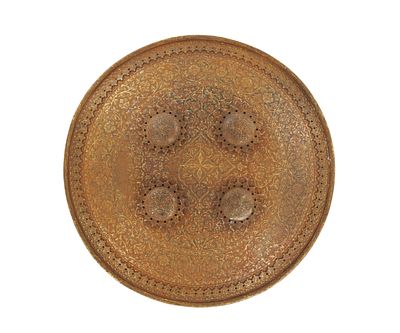 A 19TH CENTURY INDIAN GOLD-KOFTGARI WORK STEEL SHIELD of domed circular form with applied 